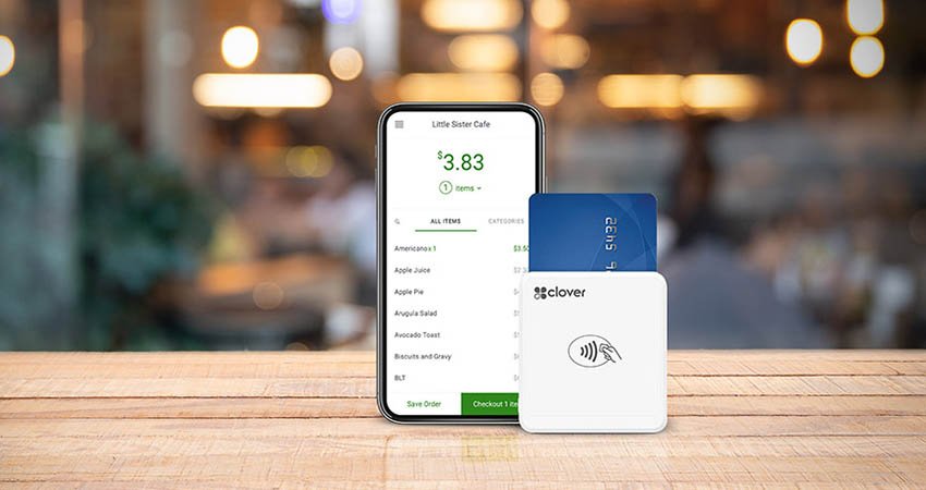 Mobile Clover card reader connected to a smartphone for an in-person payment